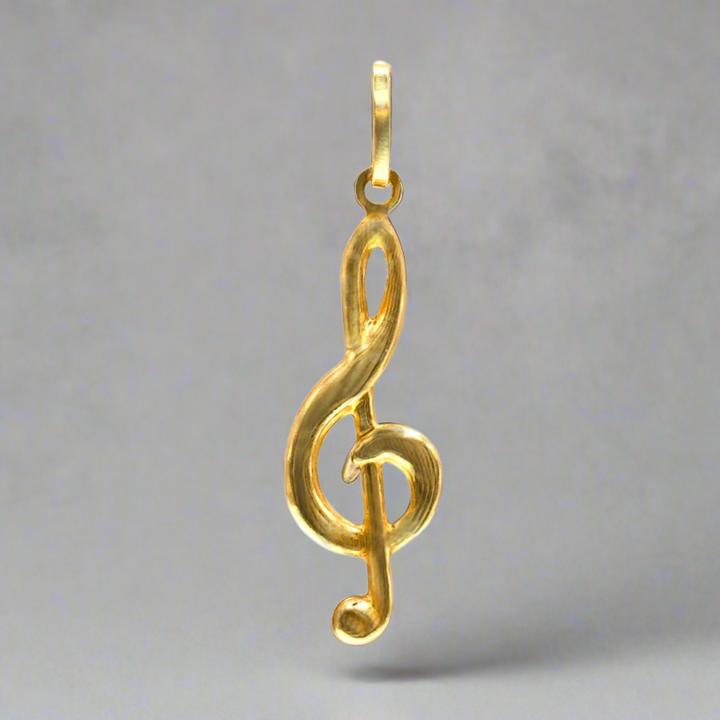 front of the g-clef pendant