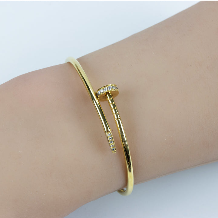 Model wearing a hinge design bangle, beautifully showcasing its elegant design