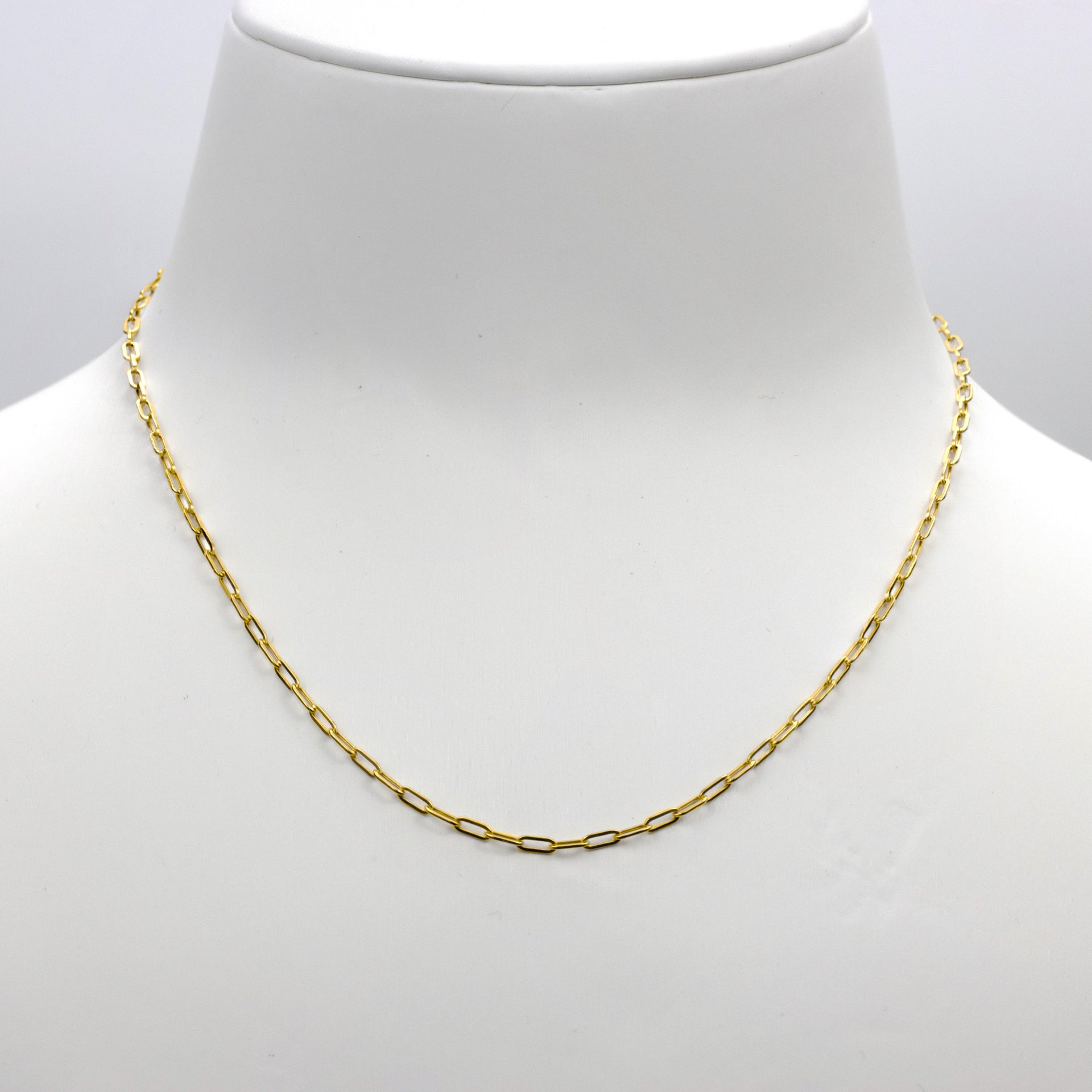 Elegantly displayed paperclip design chain necklace, radiating an aura of sophistication