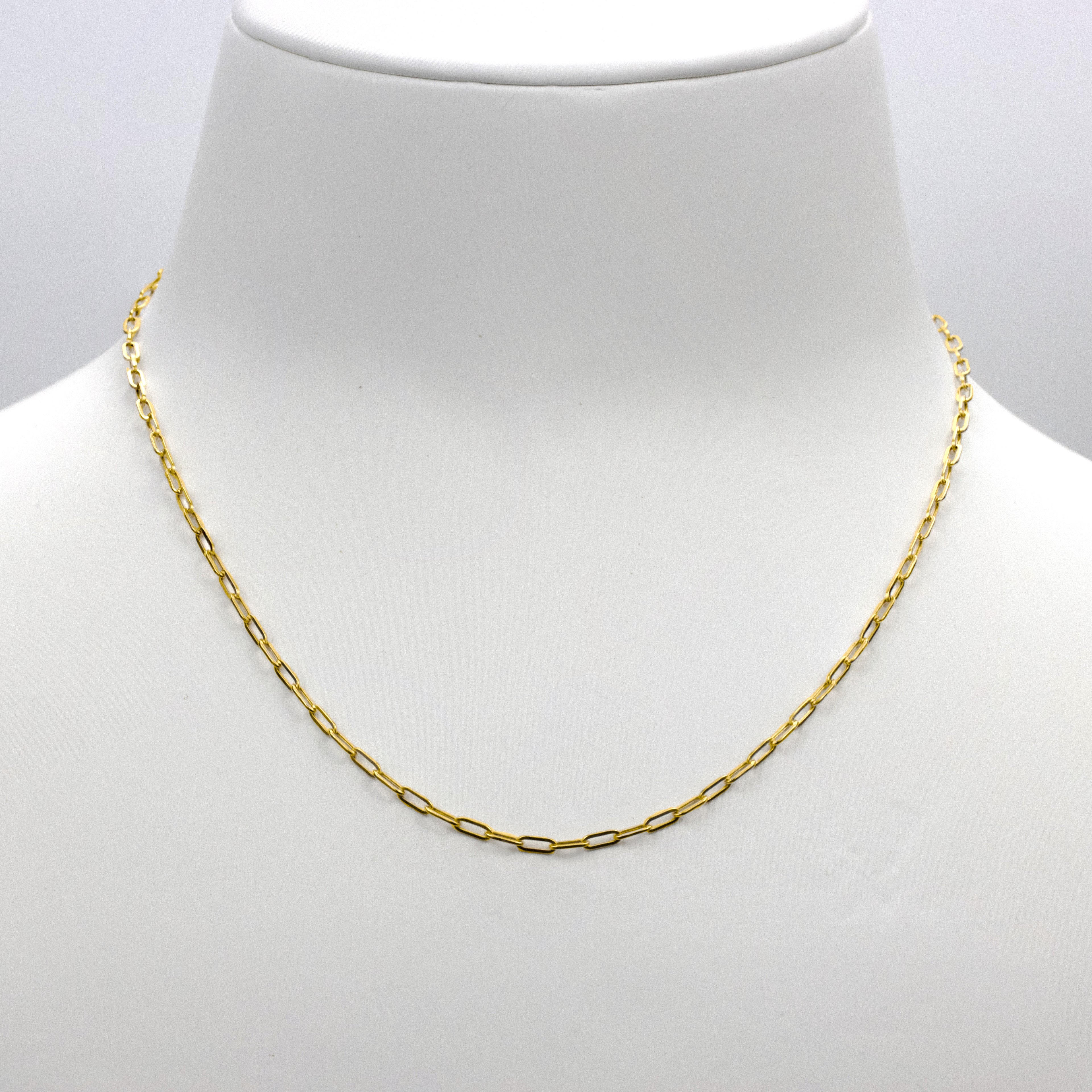 Elegantly displayed paperclip design chain necklace, radiating an aura of sophistication