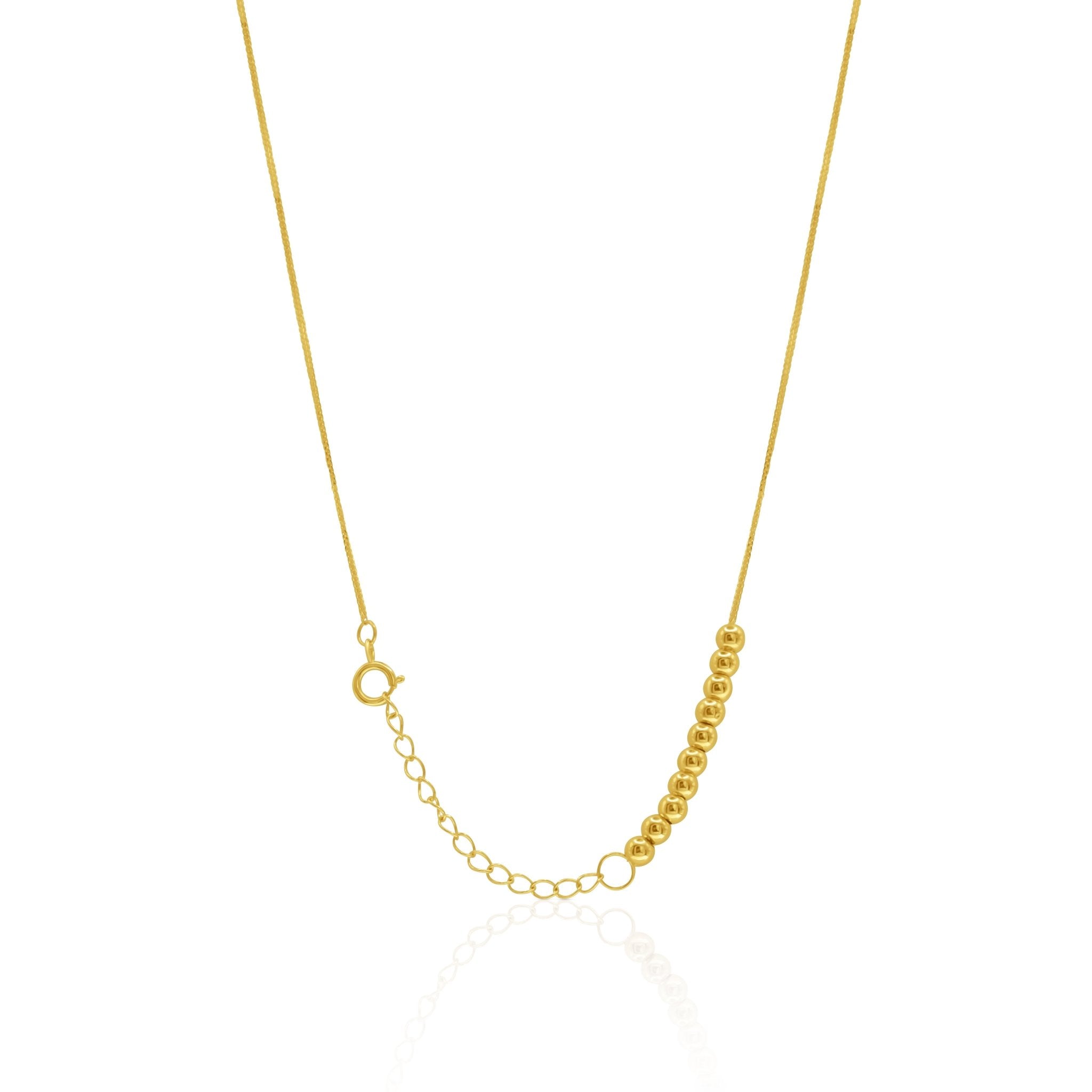 Golden Bead Accent Necklace – 18K Gold Asymmetrical Design - Delma Gold Jewelry